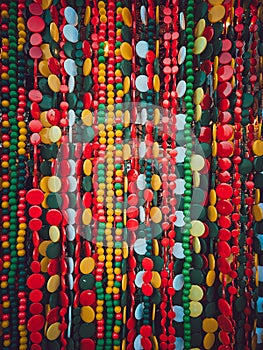 Beautiful multi-colored bead curtains under the lights