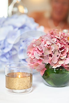 A beautiful multi-colored bouquet of hydrangeas on the table. Home comfort.