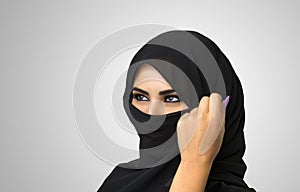 Beautiful Muslim girl wearing burqa closeup