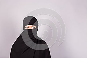 Beautiful Muslim girl wearing burqa closeup