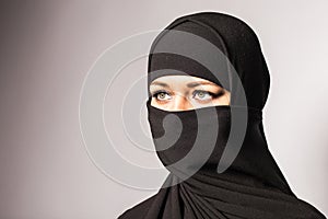 Beautiful Muslim girl wearing burqa closeup