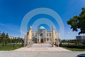 Beautiful muslim mosque on a sunny day against blue sky