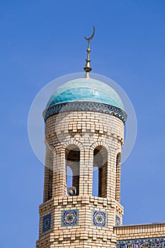 Beautiful muslim mosque on a sunny day against blue sky