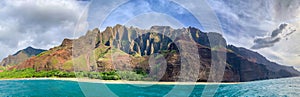 Beautiful Na Pali coast, Kauai, Hawaii view from off shore sea sunset boat cruise tour. Nature coastline landscape in USA. Hawaii photo