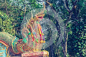 Beautiful naga statue at the staircase leading to the temple of