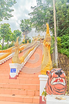 Beautiful nagas staircase upward to the temple at Wat Phra That Chom Sak, thai public Buddhist temple. Located in Mueang, Chiang