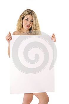 Beautiful naked blonde holding a blank sign photo