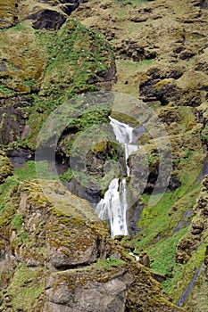 Beautiful Nameless waterfall in vicinities of Vic in Iceland