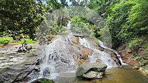 The beautiful Namuang 2 Waterfall, hidden amidst the lush jungle of Koh Samui, Thailand