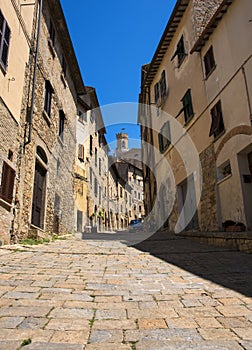 Beautiful narrow street of historic tuscan city Volterra