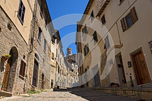 Beautiful narrow street of historic tuscan city Volterra