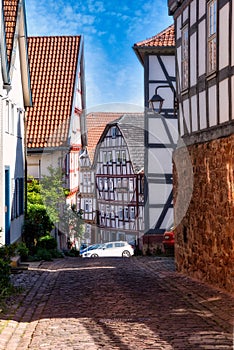 Beautiful narrow street in the old town of Schlitz, Vogelsberg, Germany photo