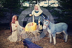 Beautiful nativity scene with baby Jesus. Traditional Christmas background of Christian holidays