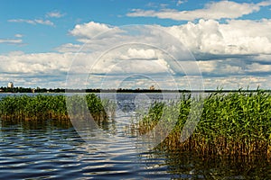 Beautiful natural landscape with lake and cloudy sky