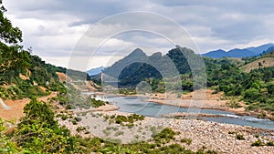 Beautiful Natural Landscape With Thach Han River In Dry Season And Green Mountain In Quang Tri Province, Vietnam.