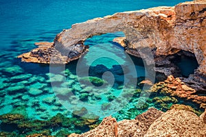 Beautiful natural rock arch near of Ayia Napa, Cavo Greco and Protaras on Cyprus island, Mediterranean Sea. Legendary bridge