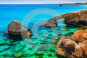 Beautiful natural rock arch near of Ayia Napa, Cavo Greco and Protaras on Cyprus island, Mediterranean Sea. Legendary bridge photo