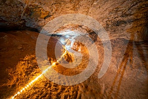 Beautiful natural rock formations - stalactite, stalagmite and stalactone in the Bacho Kiro Cave in Bulgaria