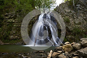 Beautiful natural romanian waterfall Bucias , in Carpathian mountains Roumania