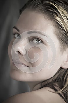 Beautiful natural woman in the daylight close up portrait