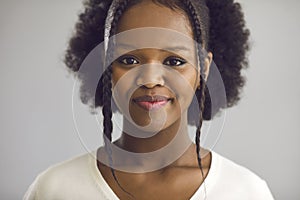 Beautiful natural young african american woman face portrait closeup studio shot