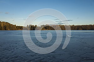 Beautiful nature and landscape photo of spring evening and ice lake in Sweden