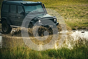 Beautiful nature. Off road car on mountain road. SUV race on dirt. Off-road travel on mountain road. Offroad 4x4 concept