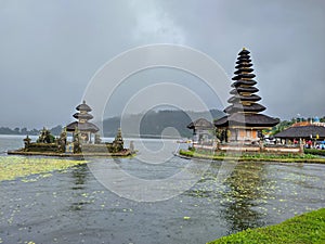 Beautiful nature photography Bali culture History in Bali temple Bedugul Indonesia fog rain reservoir beach lake