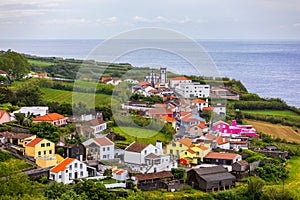 Beautiful nature view on Azores with small villages, tows, green nature fields. Amazing Azores. View of typical Azores village in