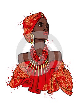 A beautiful negress in a dress and turban with patterns. Africa. Ethnic clothing and accessories, fashion and style.