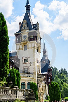 Beautiful neo-Renaissance building of Peles Castle Castelul Peles near Bucegi Mountains Muntii Bucegi in a sunny summer day in