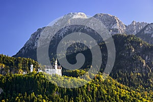 Neuschwanstein Castle with scenic mountain landscape near Fussen, Bavaria, Germany photo