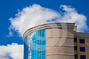 Beautiful new building with glass windows. New building in the city