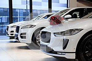 A beautiful new white car awaits its buyer in the cabin