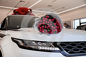 A beautiful new white car awaits its buyer in the cabin