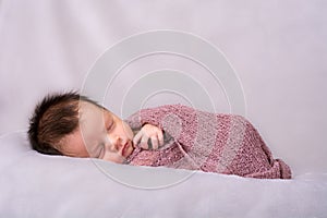 Beautiful newborn baby girl sleeping photo