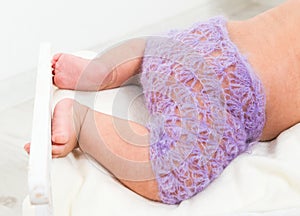 Beautiful newborn baby's legs photo