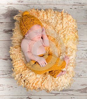 Beautiful newborn baby in wicker basket