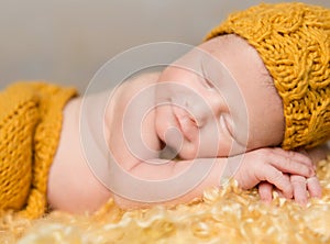 Beautiful newborn baby in wicker basket