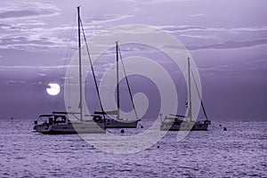 Beautiful night Adriatic sea, yachts and full moon, Croatia. Night seascape