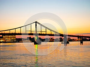 Beautiful night bridge over the Dnieper in Ukraine at sunset.