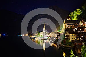 Beautiful night landscape of Hallstatt mountain village with Hallstatter lake in Austrian Alps.