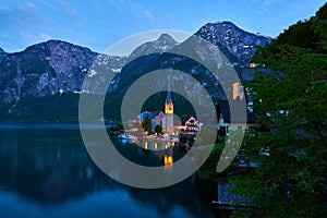 Beautiful night landscape of Hallstatt mountain village with Hallstatter lake in Austrian Alps.