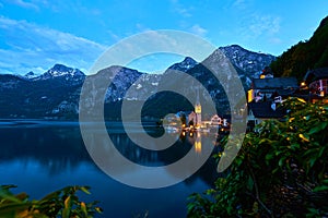 Beautiful night landscape of Hallstatt mountain village with Hallstatter lake in Austrian Alps.