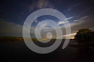 Beautiful night landscape, moonrise, lake and trees