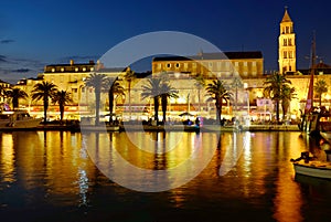Beautiful night life in Split with the old town promenade a