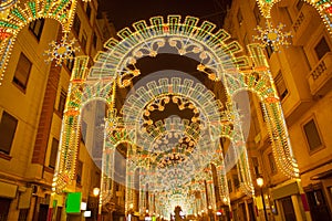 Beautiful night lights in Fallas fest of Valencia in calle Sueca