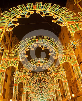 Beautiful night lights in Fallas fest of Valencia in calle Sueca photo