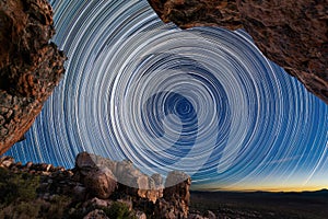 A beautiful night sky photograph with circular moving star trails