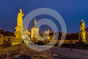 night view of Charles Bridge over Vltava river in Prague city, Czech Republic